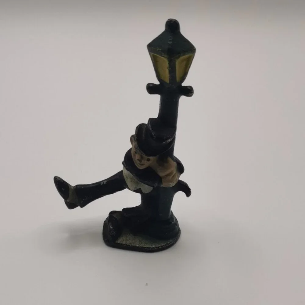 Vintage‎ Cast Iron bottle opener, Figure, Man Holding On Lamppost, 4.25